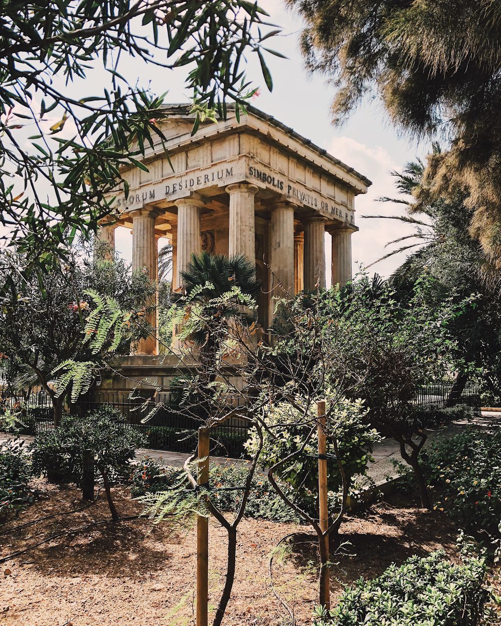 VIEW OF OLD BUILDING IN GARDEN