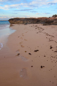 Scenic view of beach against sky