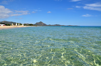 View of calm sea against blue sky