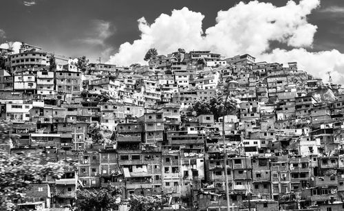 High angle view of residential buildings against sky