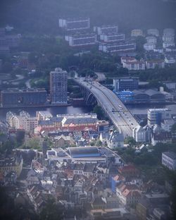 High angle view of crowd and buildings in city