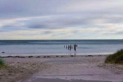 Scenic view of beach against sky