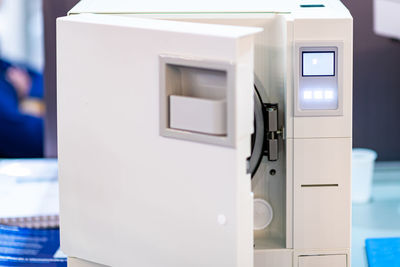 Sterilization desk with autoclave in a dental clinic. sterilization of dental medicine instruments.