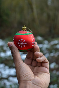 Close-up of hand holding ice cream