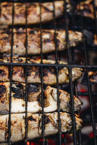 Close-up of meat on barbecue grill