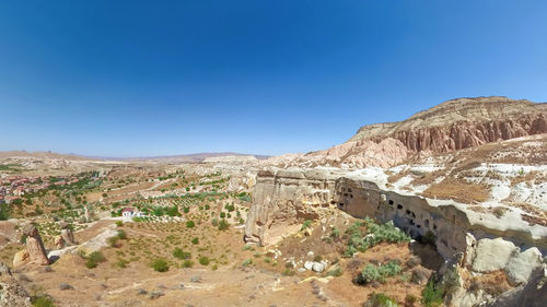 High angle view of townscape against clear blue sky