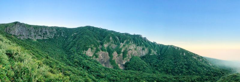 Scenic view of mountains against clear sky