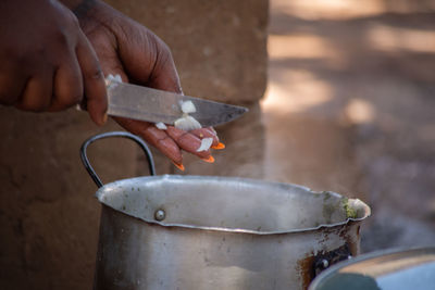 Close-up of person preparing food