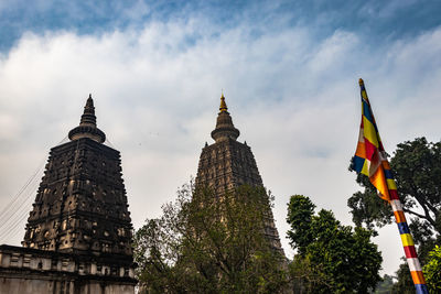 Mahabodhi temple buddhist stupas isolated with bright sky and unique prospective