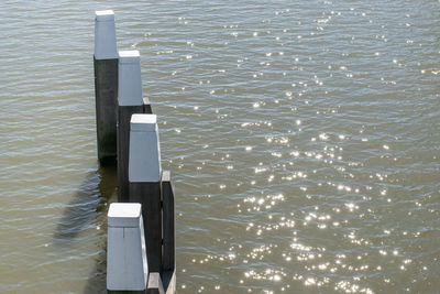 High angle view of telephone booth by sea