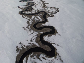 Hot creek winds its way through a california winter landscape