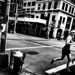 Woman standing in city