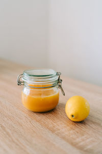 Close-up of fruits in jar on table