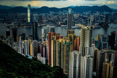 High angle view of modern buildings in city against sky