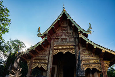 Low angle view of temple building against sky