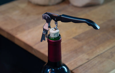 High angle view of beer bottle on table