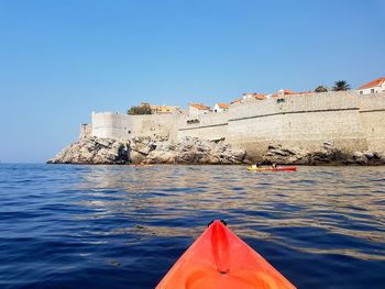 Scenic view of sea against clear blue sky