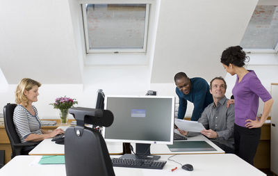 Coworkers together in office