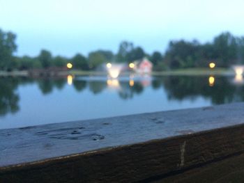 Close-up of illuminated river against clear sky