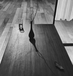 High angle view of lamp hanging on table at home