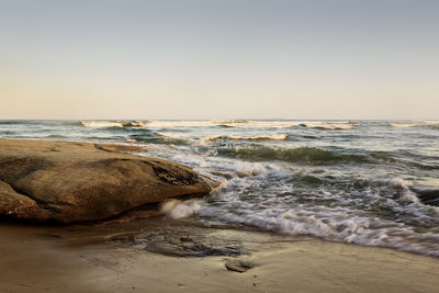 Scenic view of sea against clear sky