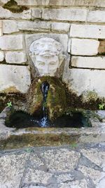 Fountain against wall