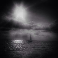 Scenic view of sea against cloudy sky
