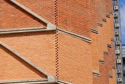 Low angle view of brick wall