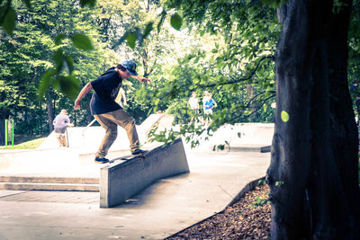 Full length of man skateboarding on skateboard