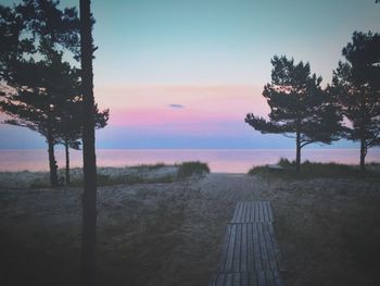 Scenic view of sea against sky at sunset