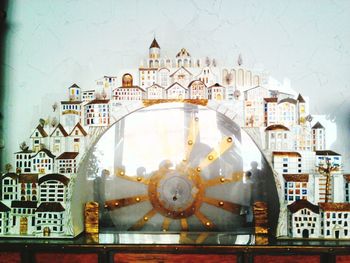 View of clock tower against buildings in city