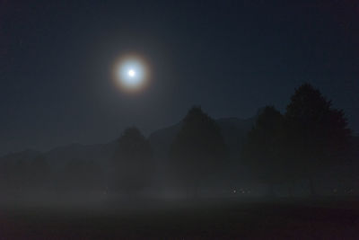 Scenic view of moon against sky at night