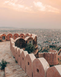 Panoramic view of buildings against sky during sunset