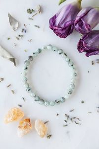 High angle view of white rose on table