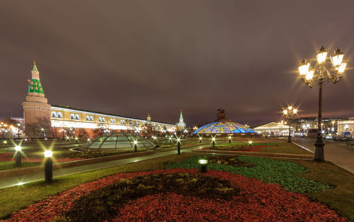 Illuminated buildings in city at night