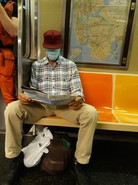 Man sitting in train