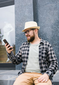 Young woman using mobile phone