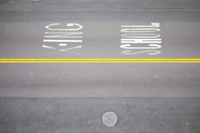 Yellow arrow symbol on road