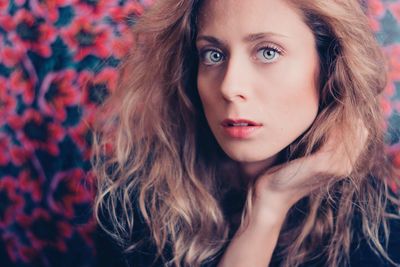 Portrait of beautiful young woman at home