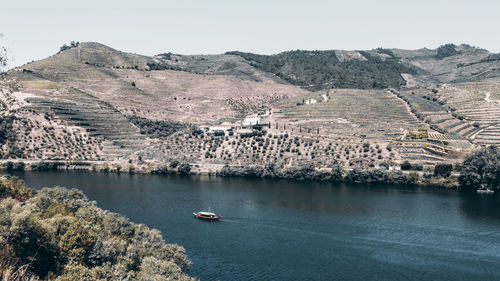 Tourist boat going down the douro river. 