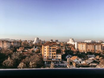 High angle view of buildings against clear sky