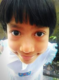Close-up portrait of smiling boy