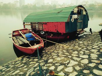 Boat moored on shore