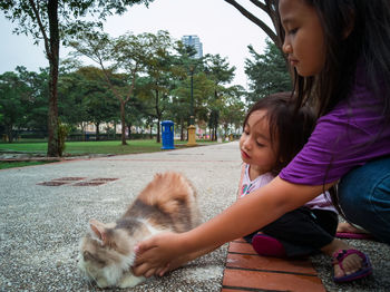 Mother and girl in park