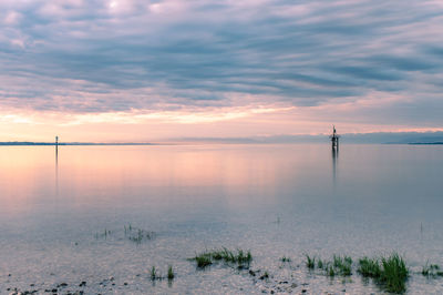 Scenic view of lake constance against sky during sunrise