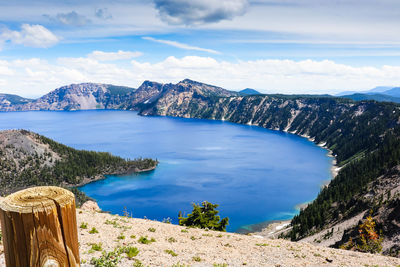 Panoramic view of sea and mountains against sky