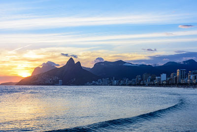 Scenic view of sea against sky during sunset