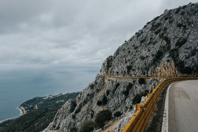 High angle view of mountain road by seaside