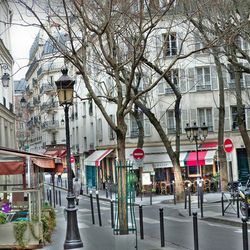 Road along buildings in city