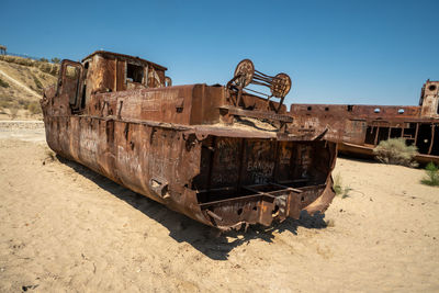 Old rusty train against clear sky